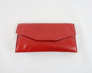 Punainen clutch-laukku