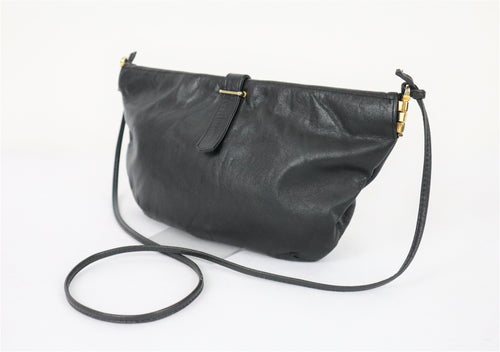Three bags musta vintage pussukkamallinen olkalaukku